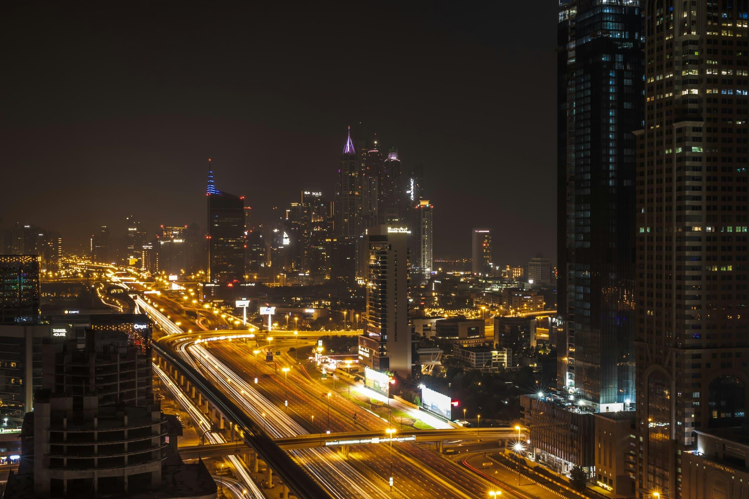 Dubai skyline along Sheikh Zayed Road at night